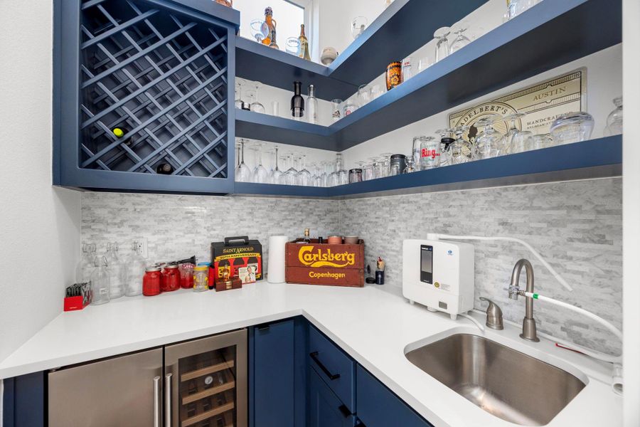 Dedicated first-floor beverage room with space for wine, craft beer, and more.