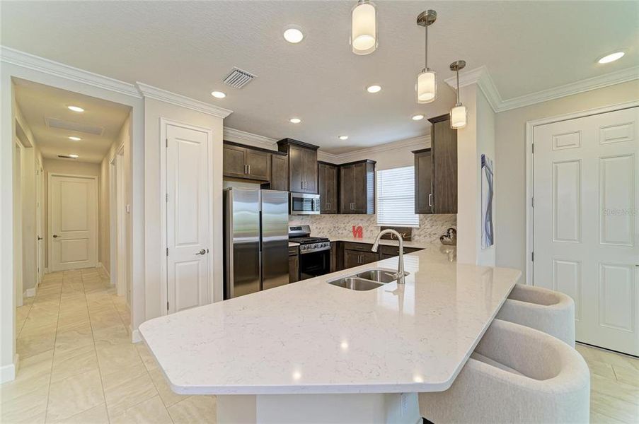 Furnished interior view inside a new home in Esplanade at Azario Lakewood Ranch, Lakewood Ranch (Image 17). Furnished interior view inside a new home in Esplanade at Azario Lakewood Ranch, Lakewood Ranch (Image 17).