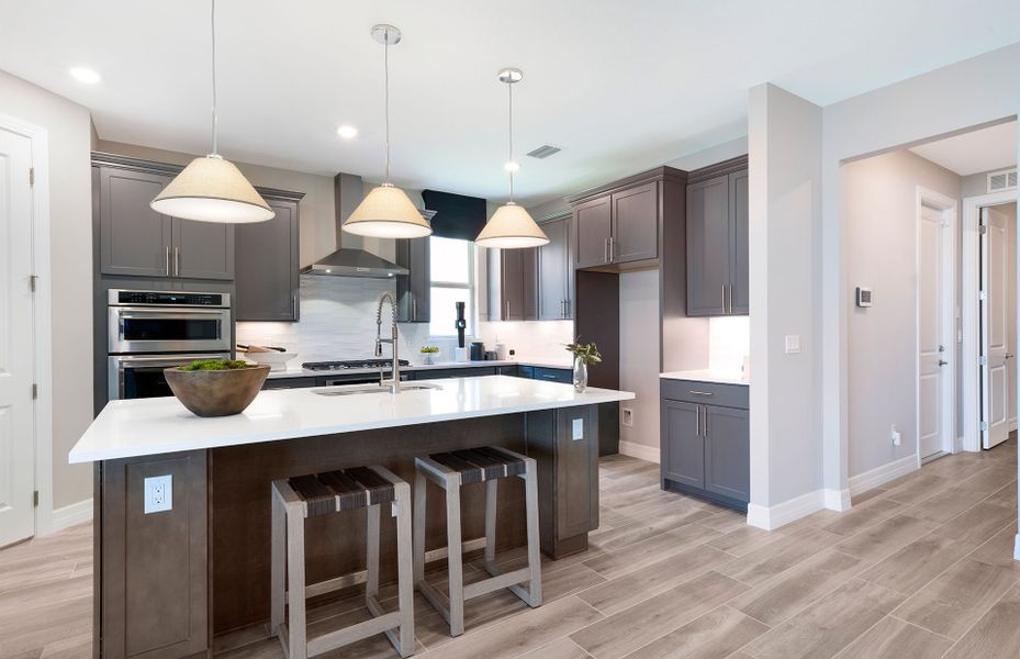 Representative furnished interior of a home built from the Easley by DiVosta in Emerson Oaks, Vero Beach (Image 31).