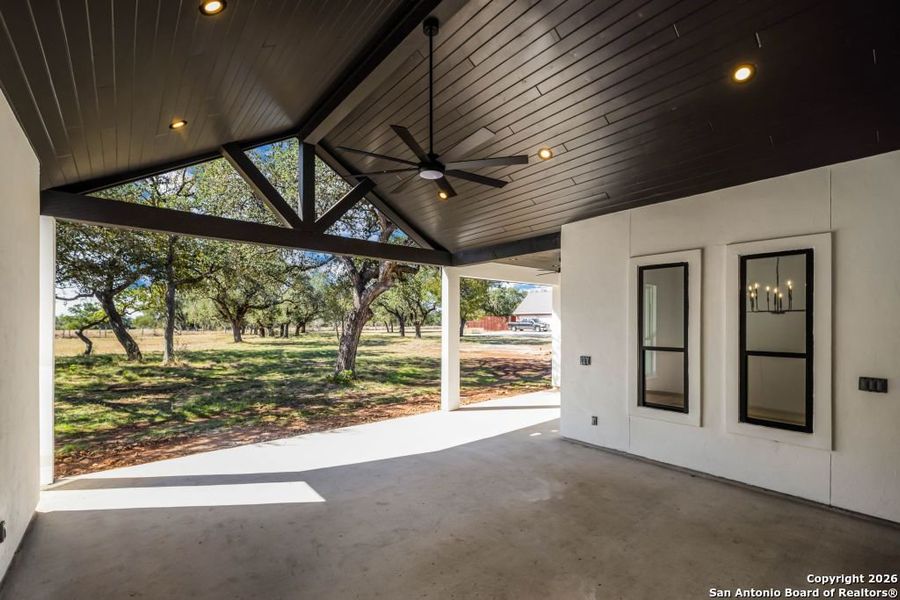 Exterior details and patio area of a home in , New Braunfels (Image 28).