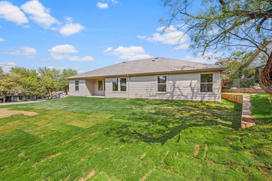 Exterior details and patio area of a home in Runaway Bay, Runaway Bay (Image 19).