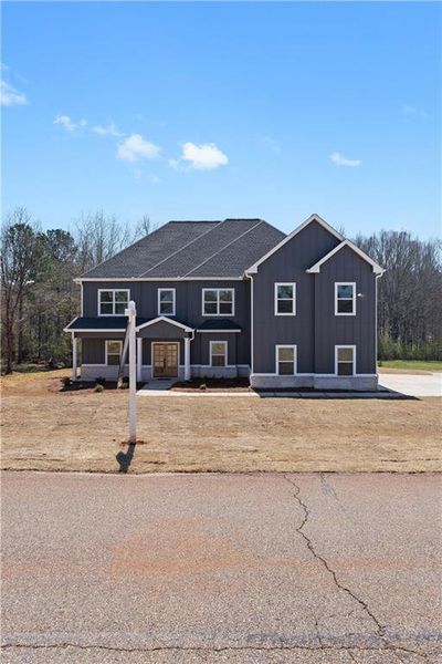 Front exterior of a new home in , Social Circle, GA, highlighting curb appeal (Image 28).
