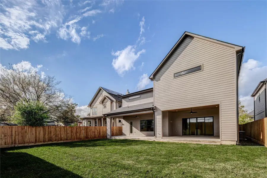 Exterior details and patio area of a home in , Houston (Image 3).