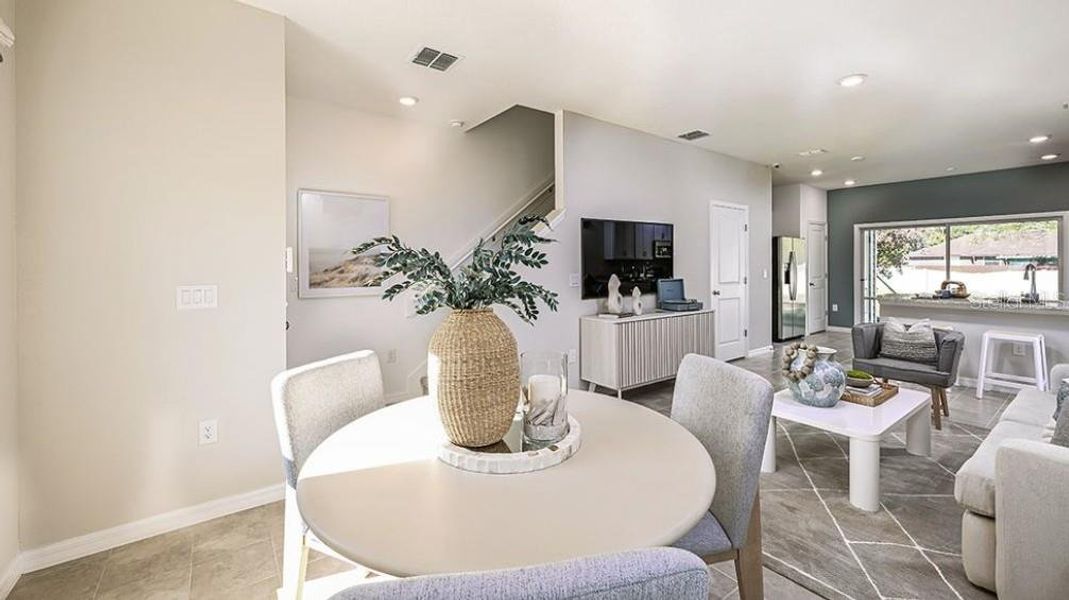 Furnished interior view inside a new home in Westview Community Group Page, Kissimmee (Image 7).