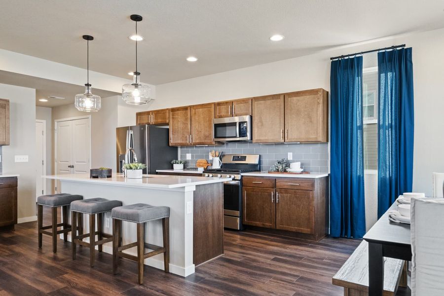 Representative furnished interior of a home built from the The Bayberry by Challenger Homes in Sky Ranch - Highland Collection, Watkins (Image 5).