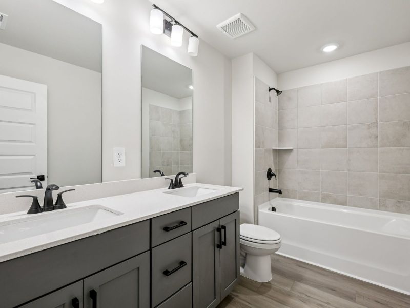 Furnished interior view inside a new home in Vines at Mill Creek - Estate Series, Braselton (Image 10).