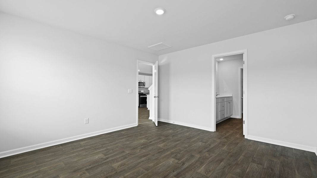 Spacious, unfurnished interior of a new home in Pine Hills Townhomes at Cane Bay, Summerville (Image 12).