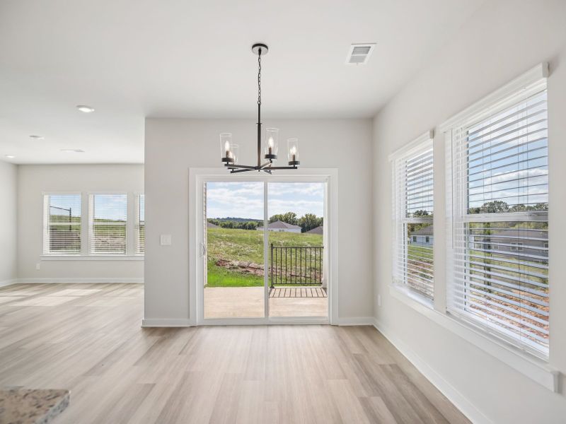 The open-concept floorplan allows for an easy flow between the kitchen and dining areas.