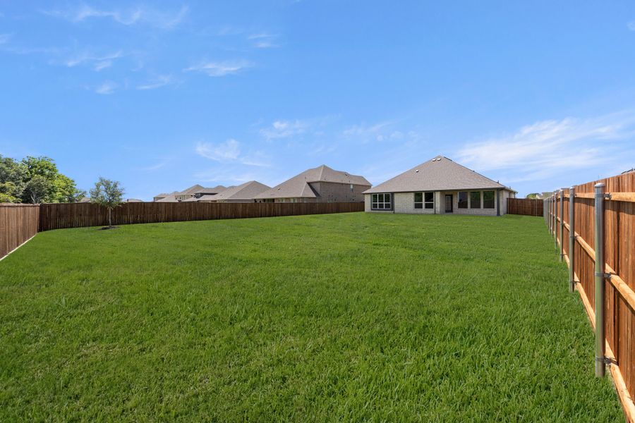 Exterior details and patio area of a home in Lovers Landing, Forney (Image 18).