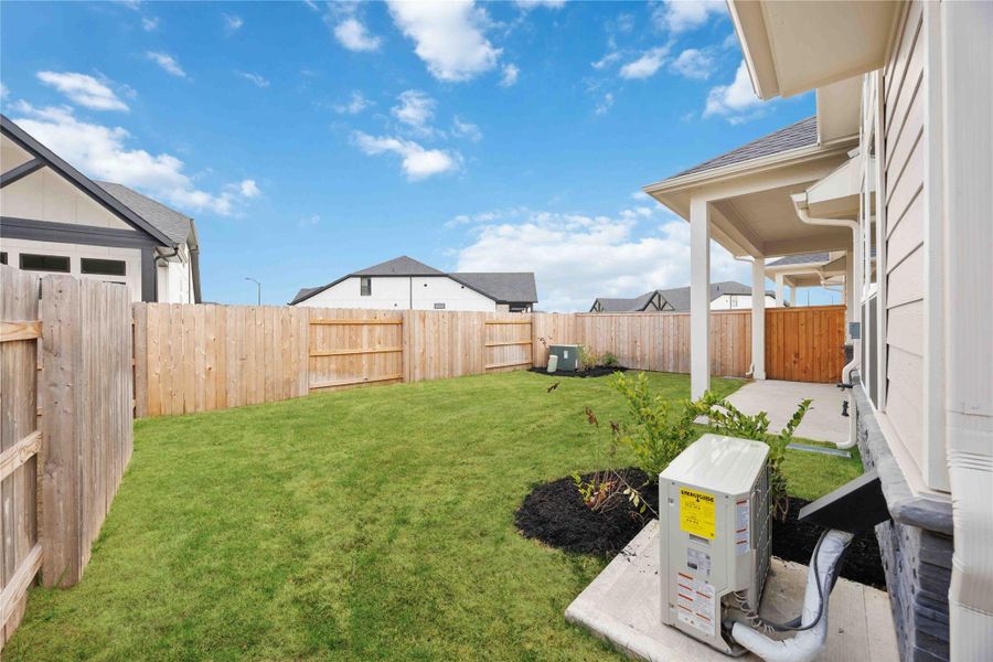 Exterior details and patio area of a home in Elyson, Katy (Image 24).