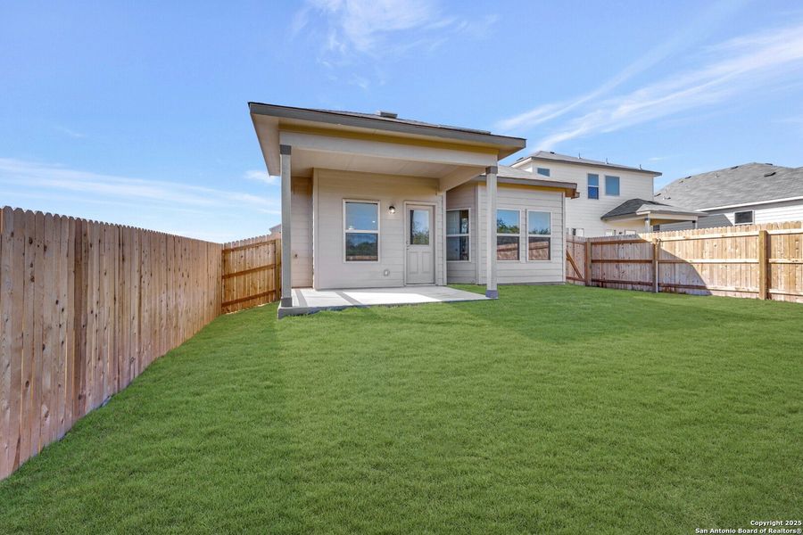 Exterior details and patio area of a home in Paloma Park, Converse (Image 16).