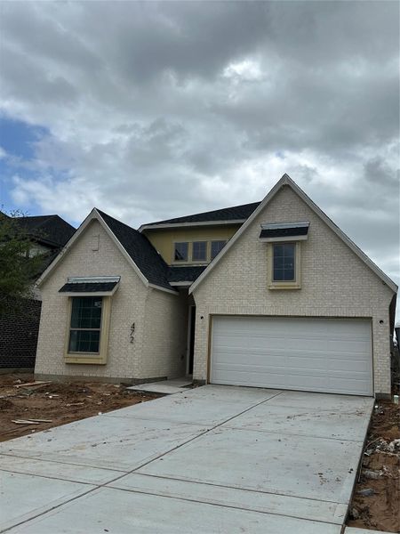 Front exterior of a new home in , Katy, TX, highlighting curb appeal (Image 1). Front exterior of a new home in , Katy, TX, highlighting curb appeal (Image 1).