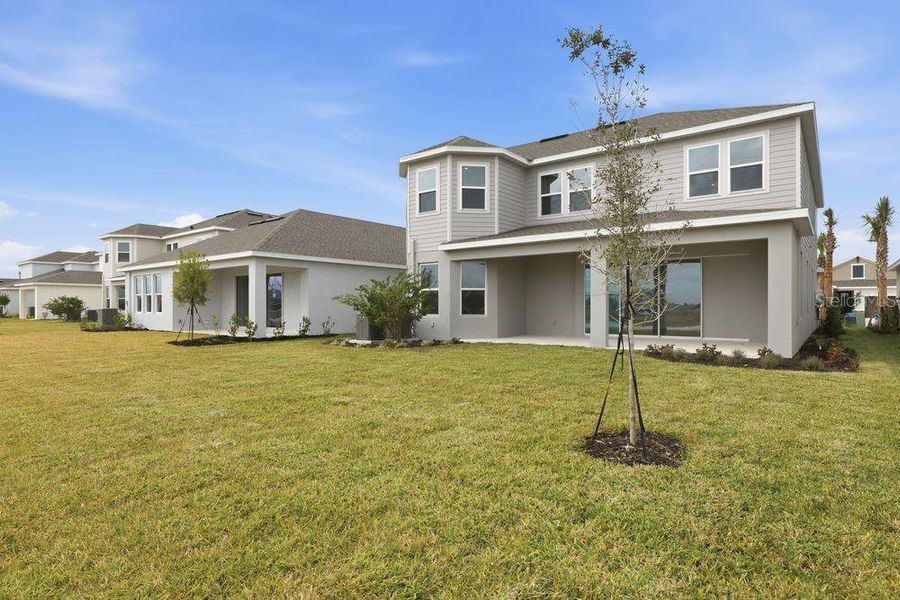 Exterior details and patio area of a home in Indigo Creek, Apollo Beach (Image 23).