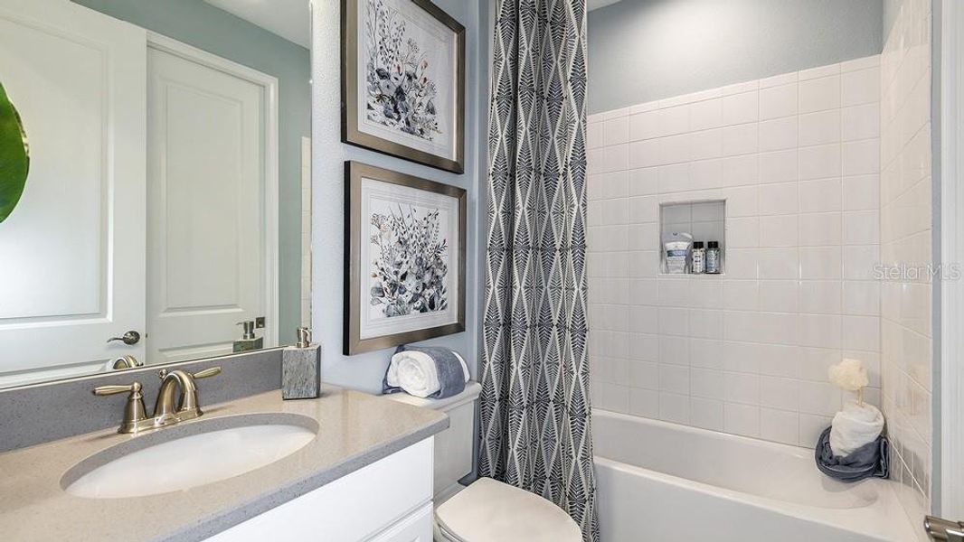 Furnished interior view inside a new home in Esplanade at Azario Lakewood Ranch, Bradenton (Image 13).