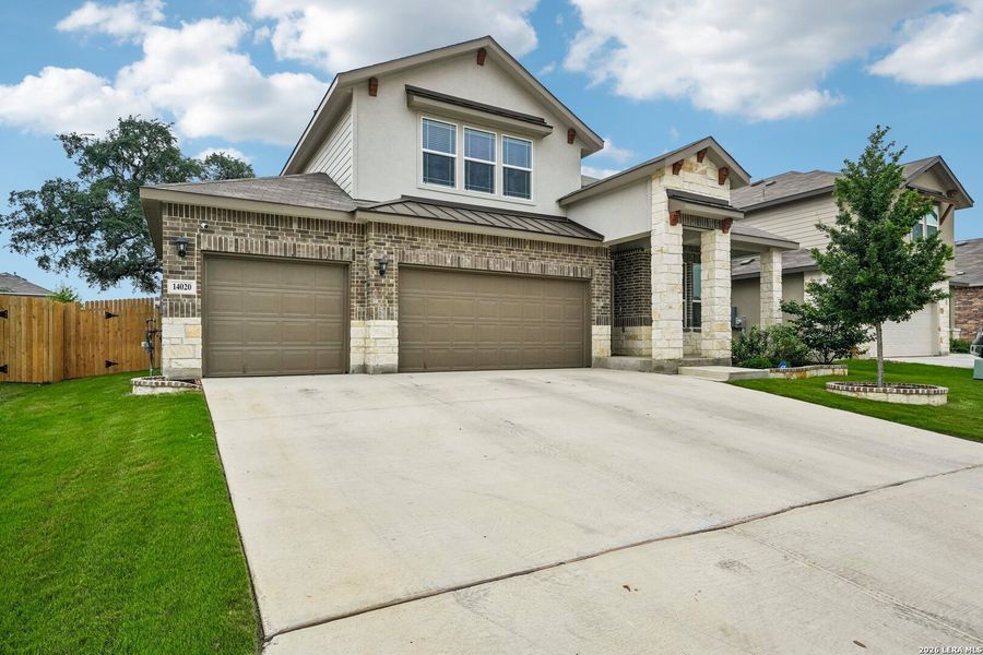 Front exterior of a new home in Riverstone at Westpointe Express, San Antonio, TX, highlighting curb appeal (Image 1). Front exterior of a new home in Riverstone at Westpointe Express, San Antonio, TX, highlighting curb appeal (Image 1).