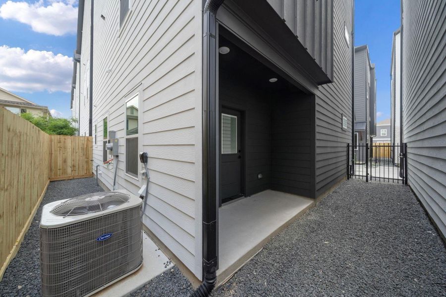 Exterior details and patio area of a home in , Houston (Image 27). Exterior details and patio area of a home in , Houston (Image 27).