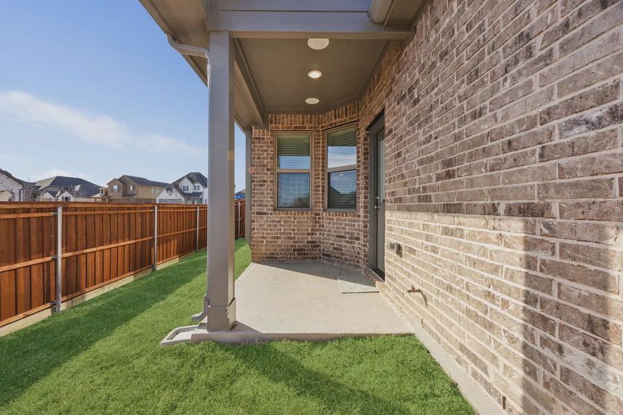 Exterior details and patio area of a home in Heartland 40's, Heartland (Image 3). Exterior details and patio area of a home in Heartland 40's, Heartland (Image 3).