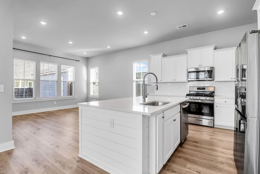 Furnished interior view inside a new home in Carnes Crossroads: Row Collection, Summerville (Image 10). Furnished interior view inside a new home in Carnes Crossroads: Row Collection, Summerville (Image 10).
