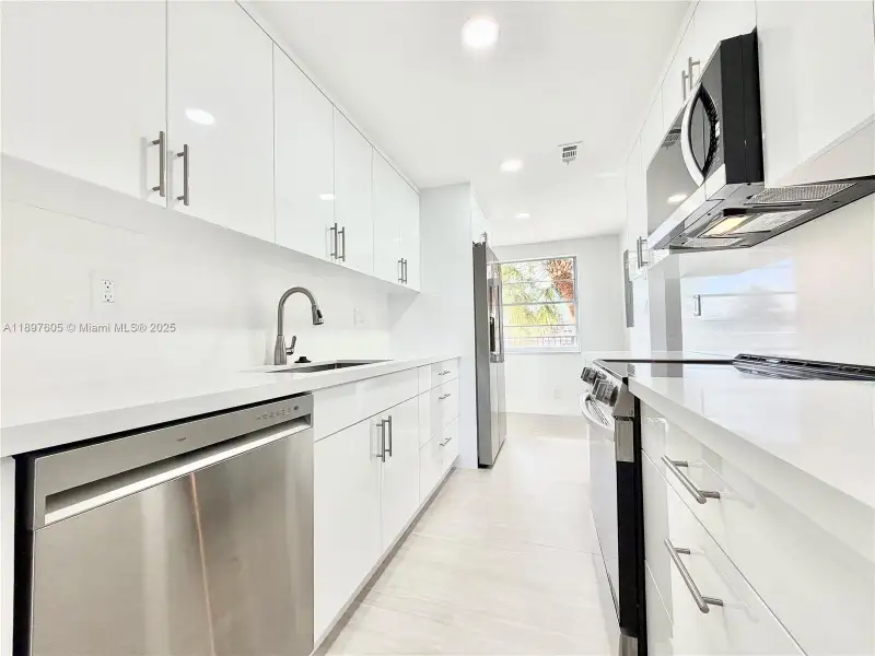 Furnished interior view inside a new home in , Lauderdale Lakes (Image 8).