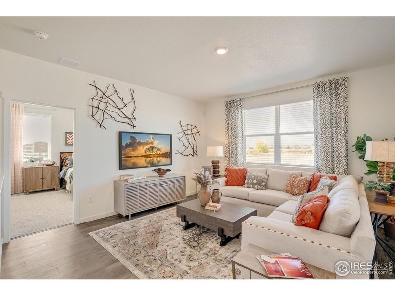 Furnished interior view inside a new home in Fossil Creek Ranch, Windsor (Image 18).