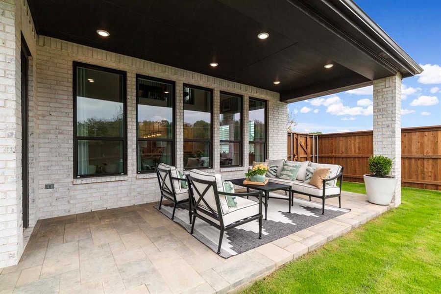 Exterior details and patio area of a home in Gateway Village - The Reserve, Denison (Image 2).