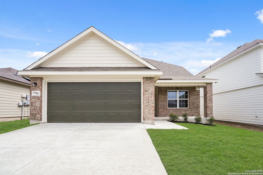 Front exterior of a new home in Cinco Lakes, San Antonio, TX, highlighting curb appeal (Image 20).