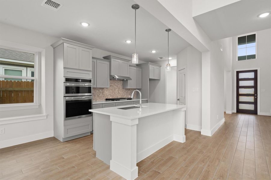 Furnished interior view inside a new home in Enclave at Cele, Pflugerville (Image 7). Furnished interior view inside a new home in Enclave at Cele, Pflugerville (Image 7).