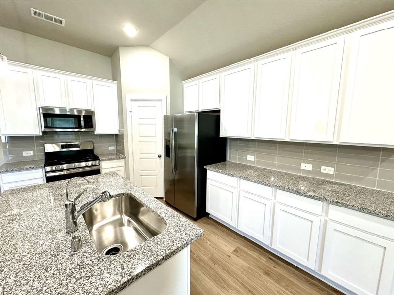 Furnished interior view inside a new home in , Cypress (Image 8).