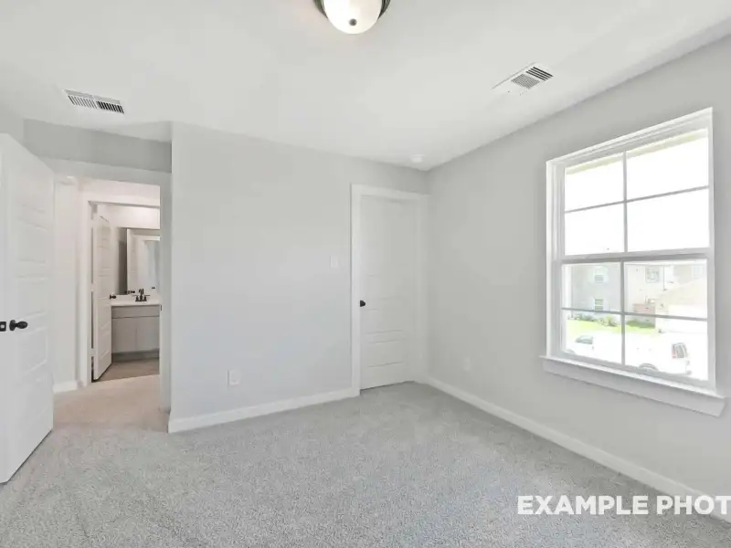 Spacious, unfurnished interior of a new home in Sundance Cove, Crosby (Image 28).