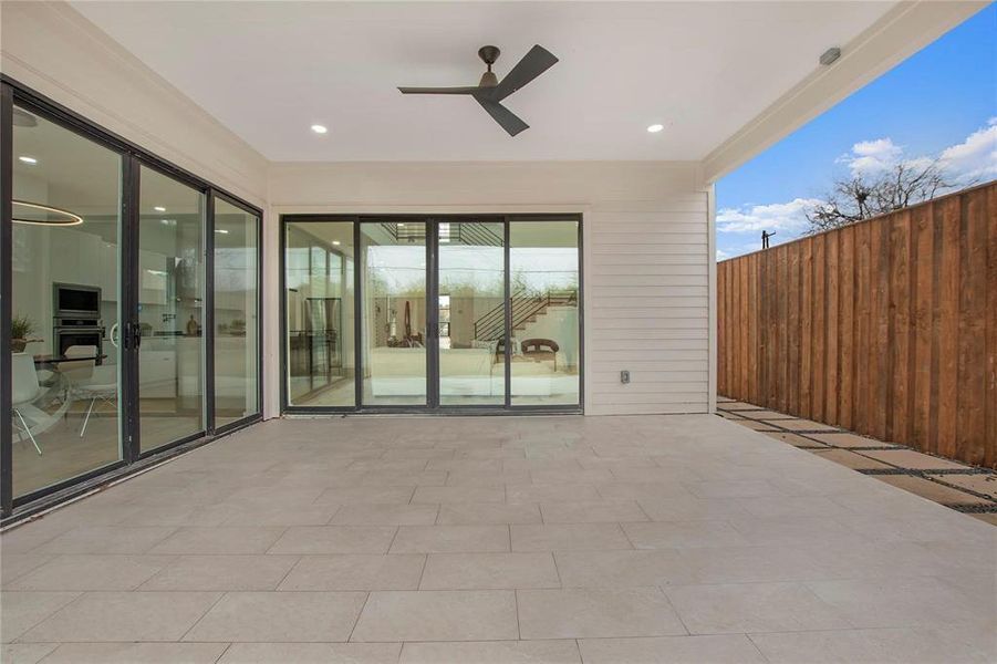 View of patio featuring ceiling fan