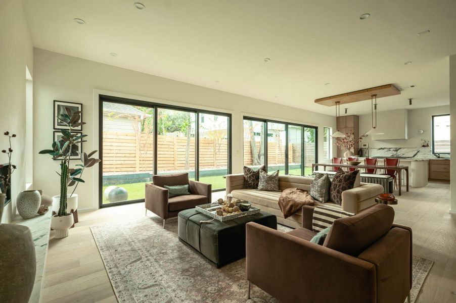 Living area open to dining and kitchen area