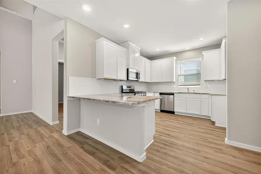 Furnished interior view inside a new home in Sunterra, Katy (Image 10). Furnished interior view inside a new home in Sunterra, Katy (Image 10).