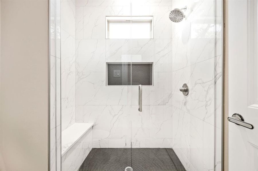 Bathroom featuring an enclosed shower