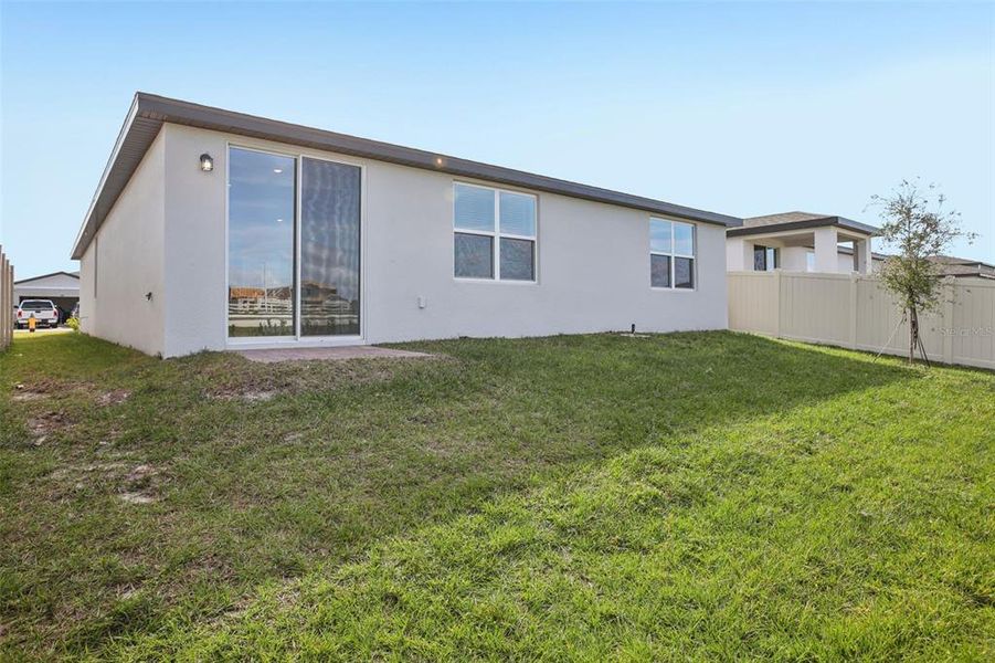 Exterior details and patio area of a home in Villamar - Signature Series, Winter Haven (Image 20).