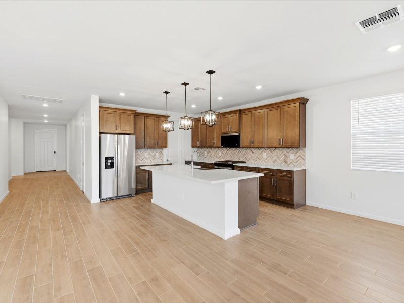 Furnished interior view inside a new home in Blossom Rock Reserve Series, Apache Junction (Image 5).