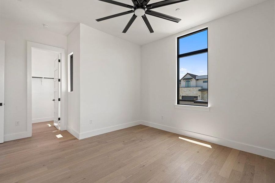 Spacious, unfurnished interior of a new home in Milky Way at River Place, Austin (Image 25).