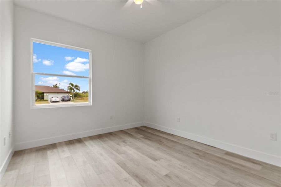 Spacious, unfurnished interior of a new home in , Port Charlotte (Image 30).