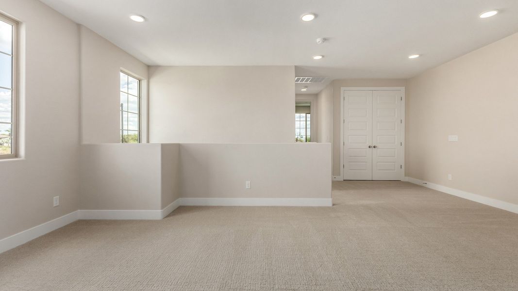 Representative furnished interior of a home built from the The Delaney by DRB Homes in Surprise City Center, Surprise (Image 20).