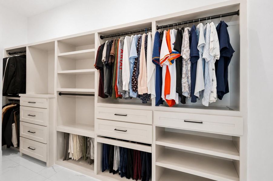 Second closet thoughtfully designed with abundant storage throughout.