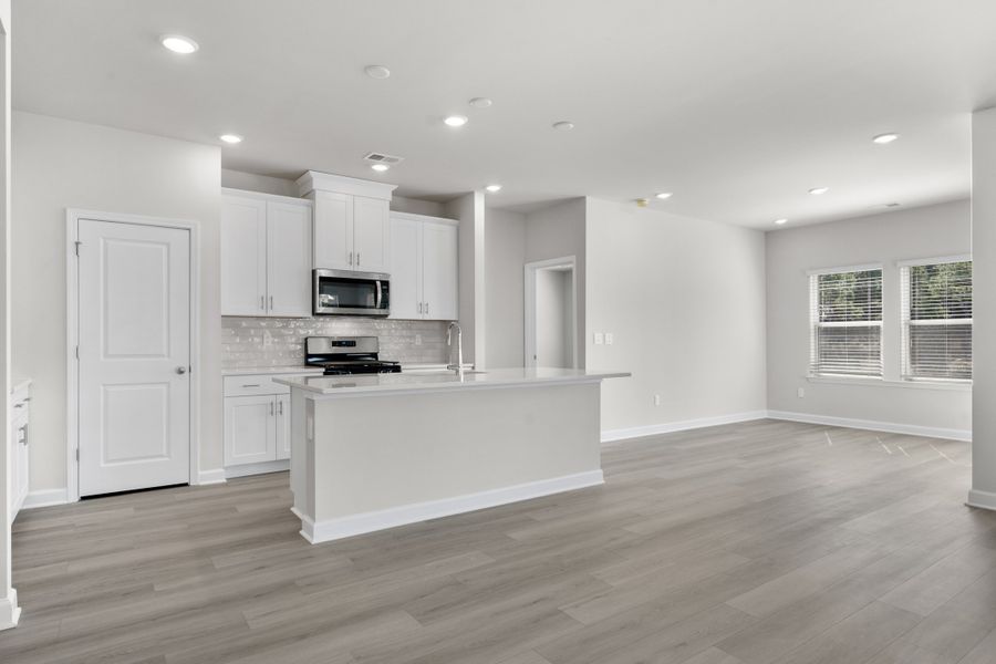 Furnished interior view inside a new home in Waterside - Coastline Series, Longs (Image 4).