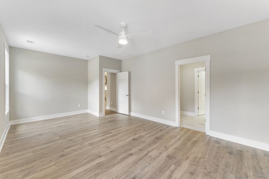 Representative unfurnished interior of a home built from the Crosby by Hunter Quinn Homes in Landing at Clemson Marina, Seneca (Image 16).