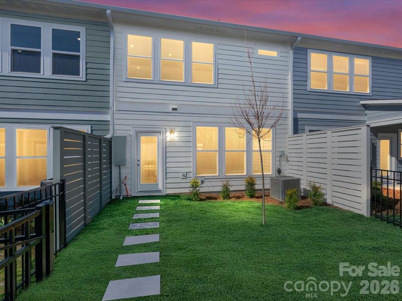 Exterior details and patio area of a home in North Creek Village, Huntersville (Image 4).