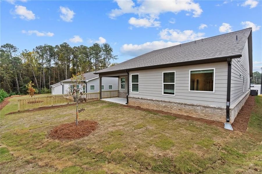 Front exterior of a new home in Kelly Preserve, Loganville, GA, highlighting curb appeal (Image 43).