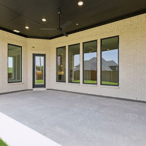 Exterior details and patio area of a home in The Parks at Wilson Creek, Celina (Image 29). Exterior details and patio area of a home in The Parks at Wilson Creek, Celina (Image 29).