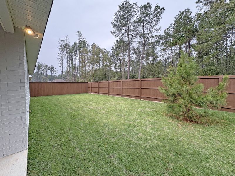 Exterior details and patio area of a home in Longleaf, Lumberton (Image 24).