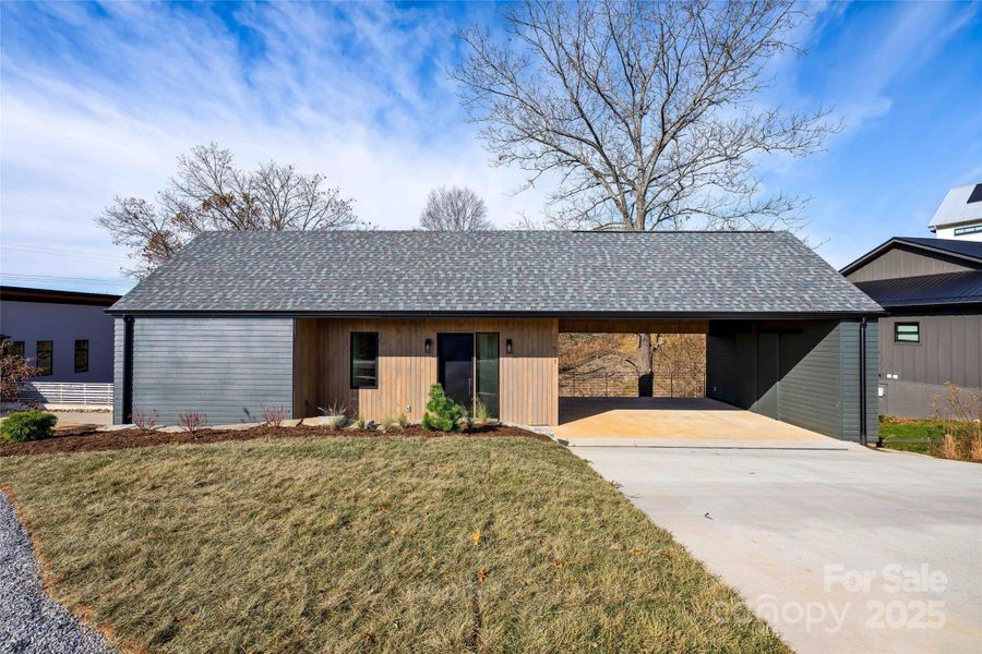 Exterior details and patio area of a home in , Asheville (Image 25).