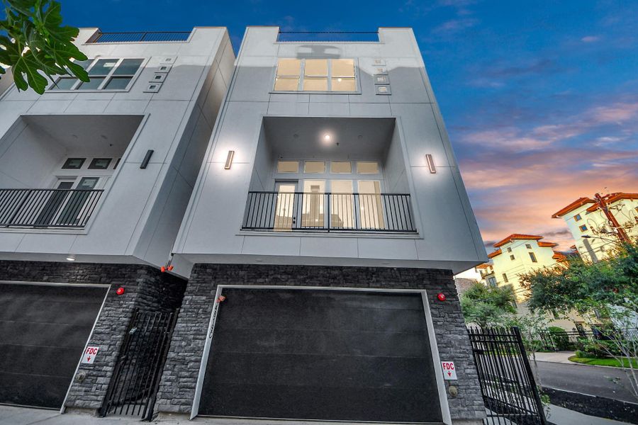 Front exterior of a new home in , Houston, TX, highlighting curb appeal (Image 24).