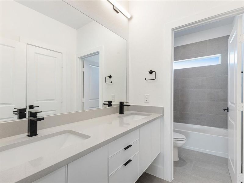 Furnished interior view inside a new home in Royal Court, Little Elm (Image 10).