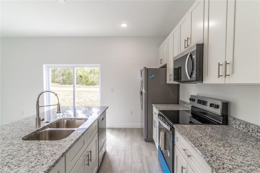 Furnished interior view inside a new home in , Ocala (Image 7).