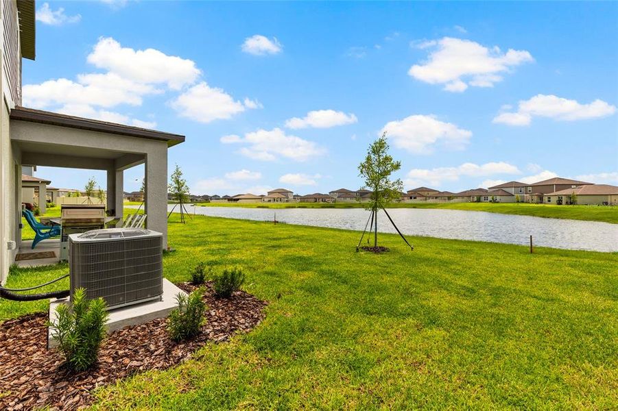 Exterior details and patio area of a home in Prosperity Lakes, Parrish (Image 34). Exterior details and patio area of a home in Prosperity Lakes, Parrish (Image 34).